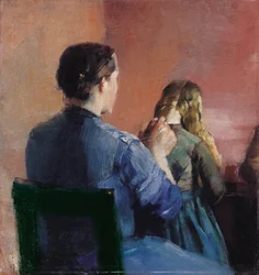 Una madre peinando el cabello de su pequeña hija